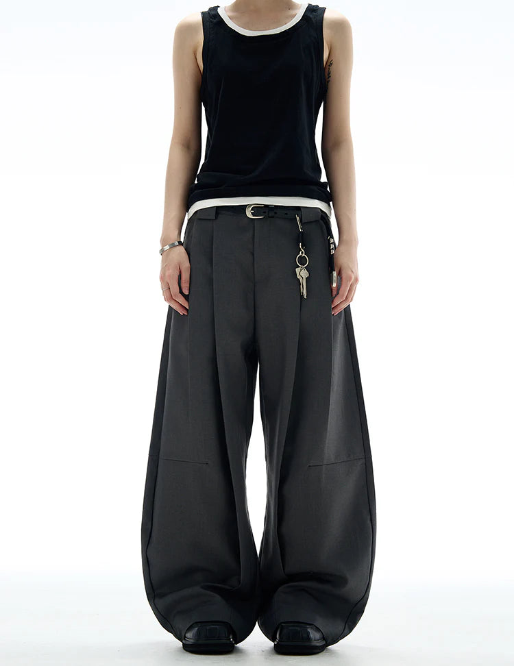 THE WIDE PLEATED SUIT PANTS