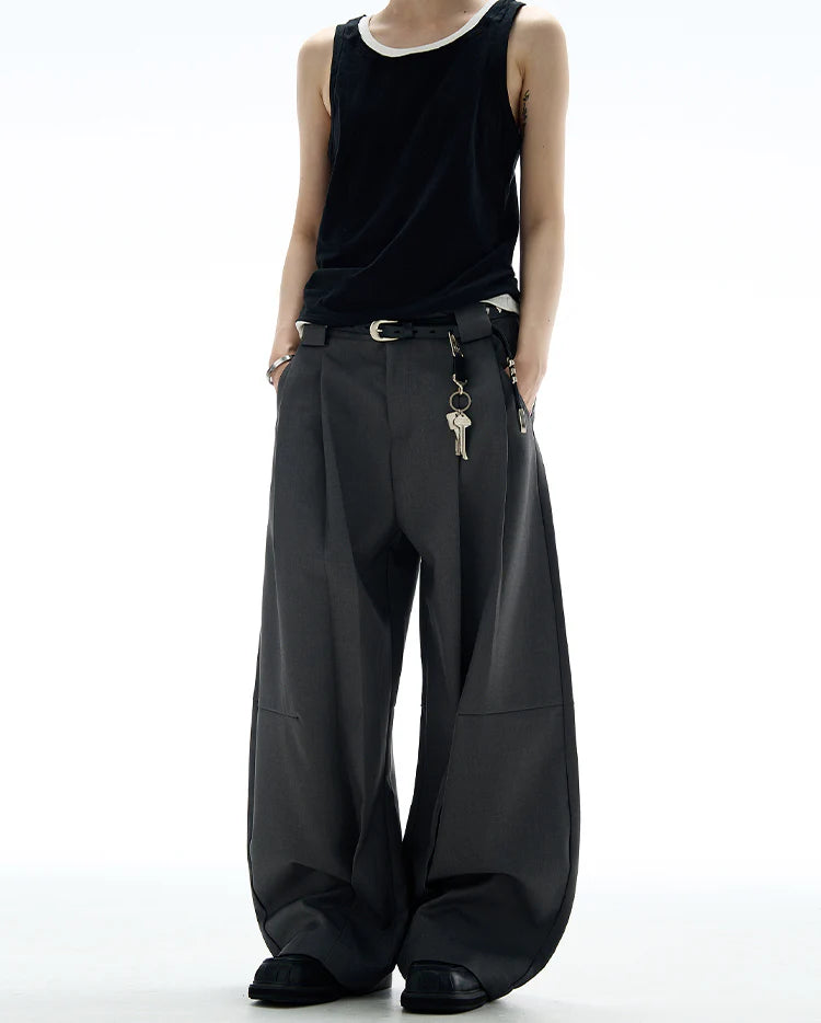 THE WIDE PLEATED SUIT PANTS