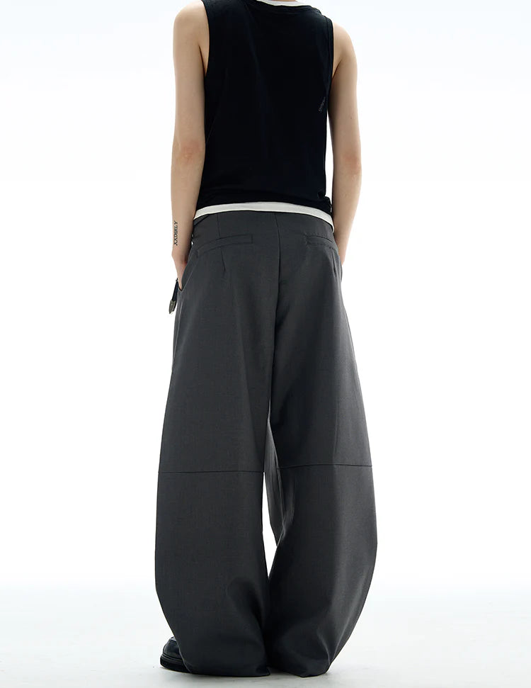 THE WIDE PLEATED SUIT PANTS