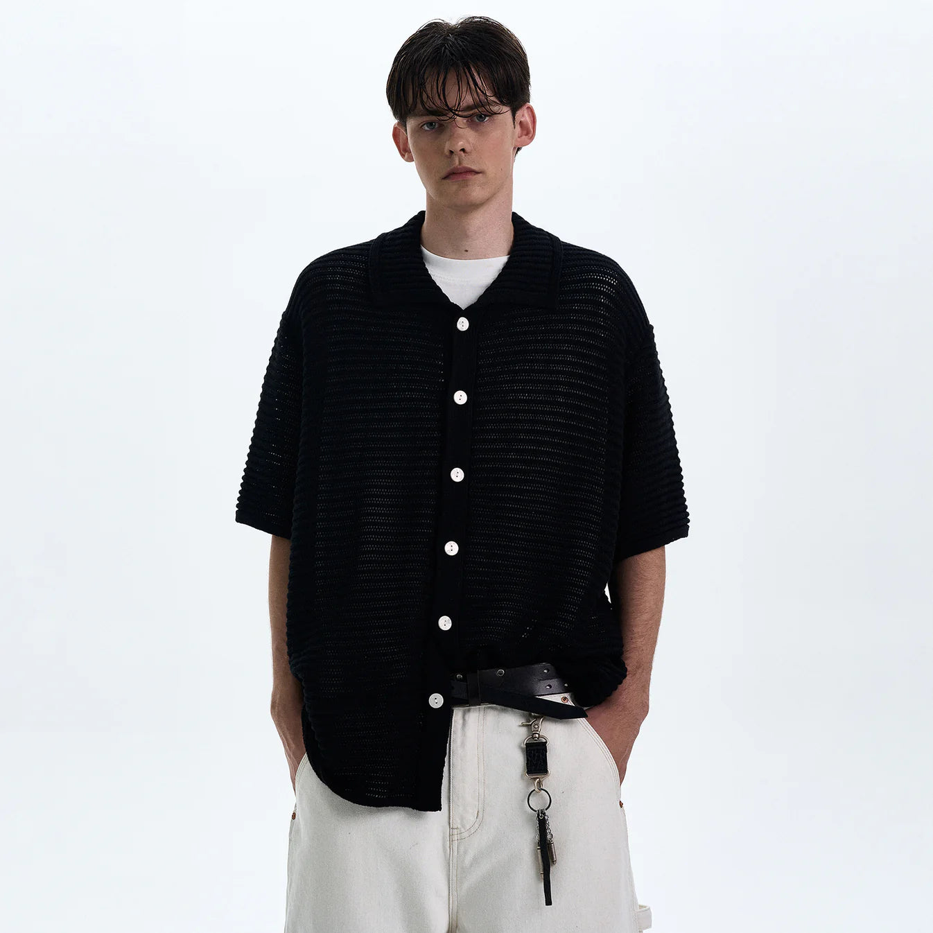 THE OPEN KNIT BUTTON POLO